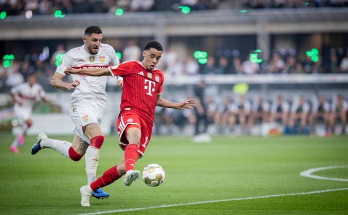 Berlin, Germany. 23rd Mai 2026. Jamal Musiala (FCB) Jeff Chabot (VfB) Bayern München - VfB Stuttgart 23.05.2026