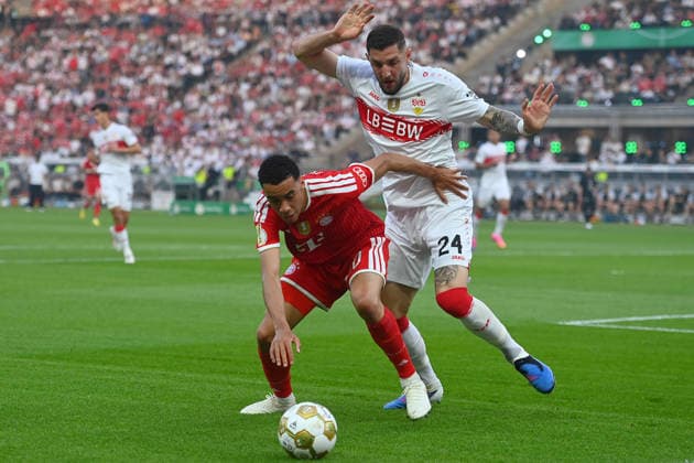 Jeff CHABOT (VFB Stuttgart), Aktion,Zweikampf gegen Jamal MUSIALA (Bayern Muenchen). Fussball 83. DFB Pokal Finale 2026 FC Bayern Muenchen - VfB Stuttgart am 23.05.2026, Olympiastadion in Berlin. DFL DFB regulations prohibit any use of photographs as image sequences and or quasi-video