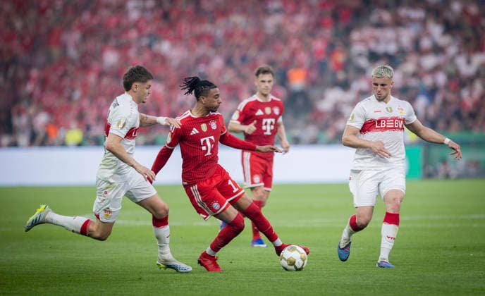 Berlin, Germany. 23rd Mai 2026. Michael Olise (FCB) Ramon Hendriks (VfB) Ermedin DemiroviÄ‡ (VfB) Bayern München - VfB Stuttgart 23.05.2026
