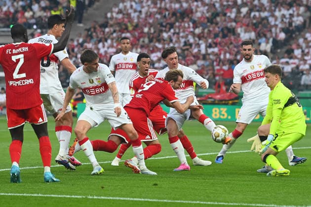 Strafraumszene.v.re.Torwart Alexander NUEBEL (VFB Stuttgart),Jeff CHABOT (VFB Stuttgart), Angelo STILLER (VFB Stuttgart), Harry KANE (Bayern Muenchen), Jamal MUSIALA (Bayern Muenchen), Ramon HENDRIKS (VFB Stuttgart),Chema ANDRES (VFB Stuttgart),Dayot UPAMECANO (Bayern Muenchen), Aktion,Zweikampf Fussball 83. DFB Pokal Finale 2026 FC Bayern Muenchen - VfB Stuttgart am 23.05.2026, Olympiastadion in Berlin. DFL DFB regulations prohibit any use of photographs as image sequences and or quasi-video