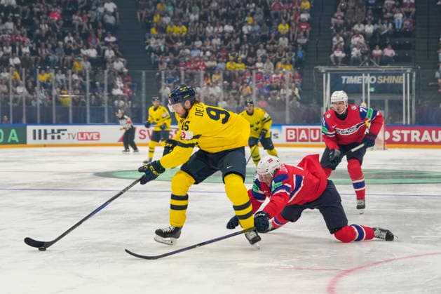 FRIBOURG, SWITZERLAND - MAY 23: Jacob de la Rose of Sweden L) tripped by Johannes Johannesen of Norway R) during the 2026 IIHF Ice hockey, Eishockey World Championship, WM, Weltmeisterschaft Switzerland game between Norway and Sweden at BCF Arena on May 23, 2026 in Fribourg, Fribourg. Fribourg BCF Arena Fribourg Switzerland Copyright: xJustPictures.ch JarixPestelaccix jp-en-EuSpIm-JP6_JAR_Norway_Sweden_23May2026_00031