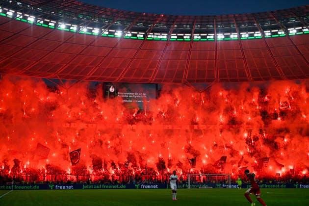 Bengalos, Pyrotechnik, Pyro, Feuerwerkskoerper, Fanblock, Fans, Fankurve, Flaggen, Fahnen, Stimmung, stimmungsvoll FC Bayern Muenchen 83. DFB Pokalfinale FC Bayern Muenchen FCB vs VFB Stuttgart Olympiastadion Berlin 23.05.2026 DFL REGULATIONS PROHIBIT ANY USE OF PHOTOGRAPHS AS IMAGE SEQUENCES AND OR QUASI-VIDEO 83. DFB Pokalfinale FC Bayern Muenchen FCB vs VFB Stuttgart