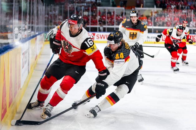 Ice hockey, Eishockey - IIHF WC 2026 ZURICH,SWITZERLAND,23.MAY.26 - ICE HOCKEY - IIHF Ice Hockey World Championship, WM, Weltmeisterschaft 2026, group stage, Austria vs Germany. Image shows Dominic Zwerger (AUT) and Joshua Samanski (GER).  GEPAxpictures xMaticxKlansek