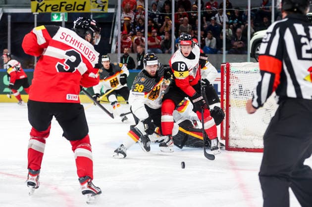 Ice hockey, Eishockey - IIHF WC 2026 ZURICH,SWITZERLAND,23.MAY.26 - ICE HOCKEY - IIHF Ice Hockey World Championship, WM, Weltmeisterschaft 2026, group stage, Austria vs Germany. Image shows Peter Schneider (AUT), Fabio Wagner (GER) and Vinzenz Rohrer (AUT).  GEPAxpictures xMaticxKlansek