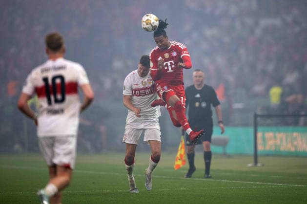 Ramon Hendriks (VfB Stuttgart) und Michael Akopovie Olise (FC Bayern Muenchen). xettx, Deutschland, Berlin, 23.05.2026, Fussball, DFB-Pokal: FC Bayern Muenchen vs VfB Stuttgart, Saison 2025 2026, Finale, Olympiastadion DFL DFB REGULATIONS PROHIBIT ANY USE OF PHOTOGRAPHS AS IMAGE SEQUENCES AND OR QUASI-VIDEO.