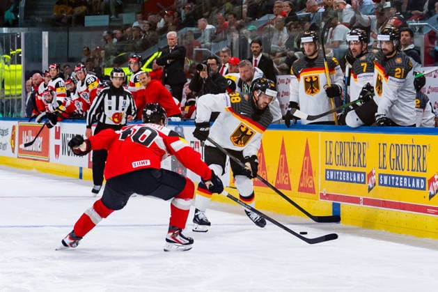 ZURICH, SWITZERLAND - MAY 23: Tim Harnisch (Austria, 40) in the battle for the puck with Fabio Wagner (Germany, 38) during the Preliminary Round - Group A Match 41 between Austria and Germany at the IIHF Ice hockey, Eishockey World Championship, WM, Weltmeisterschaft 2026, Swiss Life Arena on May 23, 2026 in Zurich, Switzerland. Zurich Switzerland Copyright: xTimoxSteinx