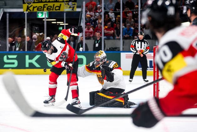 Ice hockey, Eishockey - IIHF WC 2026 ZURICH,SWITZERLAND,23.MAY.26 - ICE HOCKEY - IIHF Ice Hockey World Championship, WM, Weltmeisterschaft 2026, group stage, Austria vs Germany. Image shows Peter Schneider (AUT) and Philipp Grubauer (GER).  GEPAxpictures xMaticxKlansek