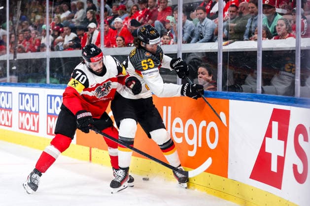 Ice hockey, Eishockey - IIHF WC 2026 ZURICH,SWITZERLAND,23.MAY.26 - ICE HOCKEY - IIHF Ice Hockey World Championship, WM, Weltmeisterschaft 2026, group stage, Austria vs Germany. Image shows Benjamin Nissner (AUT) and Moritz Seider (GER).  GEPAxpictures xMaticxKlansek