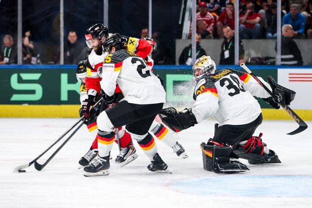 Ice hockey, Eishockey - IIHF WC 2026 ZURICH,SWITZERLAND,23.MAY.26 - ICE HOCKEY - IIHF Ice Hockey World Championship, WM, Weltmeisterschaft 2026, group stage, Austria vs Germany. Image shows Peter Schneider (AUT), Leon Huttl (GER) and Philipp Grubauer (GER).  GEPAxpictures xMaticxKlansek