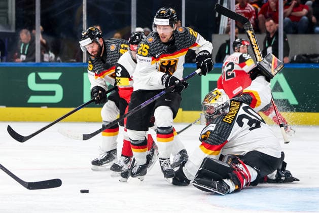 Ice hockey, Eishockey - IIHF WC 2026 ZURICH,SWITZERLAND,23.MAY.26 - ICE HOCKEY - IIHF Ice Hockey World Championship, WM, Weltmeisterschaft 2026, group stage, Austria vs Germany. Image shows Leon Huttl (GER) and Philipp Grubauer (GER).  GEPAxpictures xMaticxKlansek