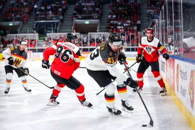 Ice hockey, Eishockey - IIHF WC 2026 ZURICH,SWITZERLAND,23.MAY.26 - ICE HOCKEY - IIHF Ice Hockey World Championship, WM, Weltmeisterschaft 2026, group stage, Austria vs Germany. Image shows Mario Huber (AUT) and Andreas Eder (GER).  GEPAxpictures xMaticxKlansek