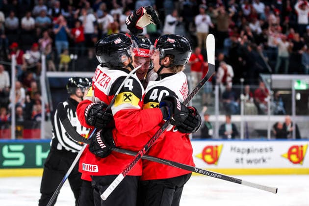 Ice hockey, Eishockey - IIHF WC 2026 ZURICH,SWITZERLAND,23.MAY.26 - ICE HOCKEY - IIHF Ice Hockey World Championship, WM, Weltmeisterschaft 2026, group stage, Austria vs Germany. Image shows the rejoicing of Ramon Schnetzer, Leon Wallner and Tim Harnisch (AUT).  GEPAxpictures xMaticxKlansek