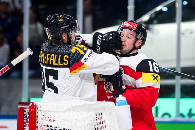 Ice hockey, Eishockey - IIHF WC 2026 ZURICH,SWITZERLAND,23.MAY.26 - ICE HOCKEY - IIHF Ice Hockey World Championship, WM, Weltmeisterschaft 2026, group stage, Austria vs Germany. Image shows Samuel Dove-McFalls (GER) and Dominic Zwerger (AUT).  GEPAxpictures xMaticxKlansek