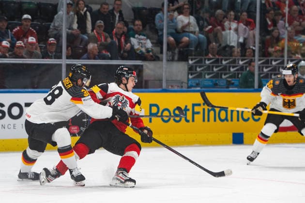 ZURICH, ZURICH - MAY 23: Fabio Wagner of Germany attempts to stop his Austria opponent during the 2026 IIHF World Championship, WM, Weltmeisterschaft match between Austria and Germany at Swiss Life Arena on May 23, 2026 in Zurich, Zurich, Switzerland.  Copyright: xLivioxBaeriswylx xSPPx Sportspressphoto_153014