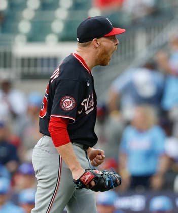 Pitcher Richard Lovelady 55 of the Washington Nationals reacts after recording the last out of the game against the Atlanta Braves at Truist Park on Saturday, May 23, 2026 in Atlanta, Georgia.  ATL20260523107 MikexZarrilli