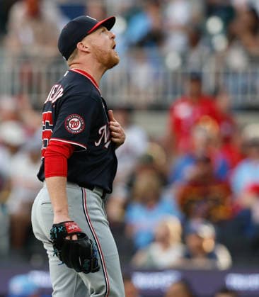 Pitcher Richard Lovelady 55 of the Washington Nationals reacts after recording the last out of the game against the Atlanta Braves at Truist Park on Saturday, May 23, 2026 in Atlanta, Georgia.  ATL20260523108 MikexZarrilli