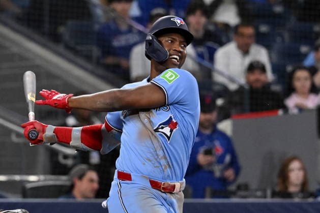 May 23, 2026, Toronto, On, Canada: Toronto Blue Jays Jesus Sanchez (12) hits an RBI double against the Pittsburgh Pirates during sixth inning MLB, Baseball Herren, USA baseball action in Toronto on Saturday, May 23, 2026. Jesus Sanchez  - ZUMAc35_ 20260523_zaf_c35_142 Copyright: xJonxBlackerx