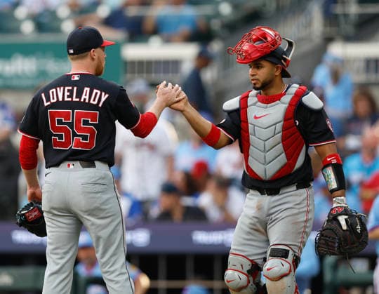 Pitcher Richard Lovelady 55 and catcher Keibert Ruiz 20 of the Washington Nationals shake hands after the last out of the game against the Atlanta Braves at Truist Park on Saturday, May 23, 2026 in Atlanta, Georgia.  ATL20260523124 MikexZarrilli
