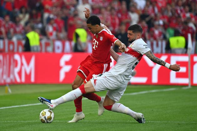 Jeff CHABOT (VFB Stuttgart), Aktion,Zweikampf gegen Jamal MUSIALA (Bayern Muenchen). Fussball 83. DFB Pokal Finale 2026 FC Bayern Muenchen - VfB Stuttgart 3-0 am 23.05.2026, Olympiastadion in Berlin. DFL DFB regulations prohibit any use of photographs as image sequences and or quasi-video