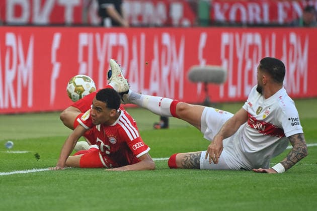 Jeff CHABOT (VFB Stuttgart), Aktion,Zweikampf gegen Jamal MUSIALA (Bayern Muenchen). Fussball 83. DFB Pokal Finale 2026 FC Bayern Muenchen - VfB Stuttgart 3-0 am 23.05.2026, Olympiastadion in Berlin. DFL DFB regulations prohibit any use of photographs as image sequences and or quasi-video
