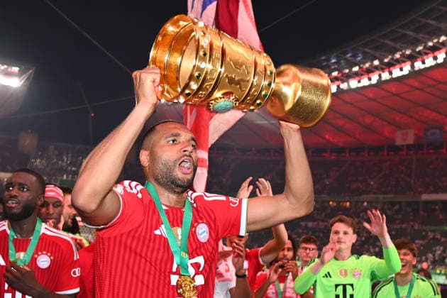 Jonathan TAH (Bayern Muenchen) mit Pokal,Cup,Trophaee, Jubel,Freude,Begeisterung, Siegerehrung. Fussball 83. DFB Pokal Finale 2026 FC Bayern Muenchen - VfB Stuttgart 3-0 am 23.05.2026, Olympiastadion in Berlin. DFL DFB regulations prohibit any use of photographs as image sequences and or quasi-video