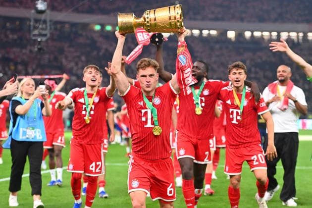 Joshua KIMMICH (Bayern Muenchen) mit Pokal,Cup,Trophaee,Jubel,Freude,Begeisterung, Siegerehrung. Fussball 83. DFB Pokal Finale 2026 FC Bayern Muenchen - VfB Stuttgart 3-0 am 23.05.2026, Olympiastadion in Berlin. DFL DFB regulations prohibit any use of photographs as image sequences and or quasi-video