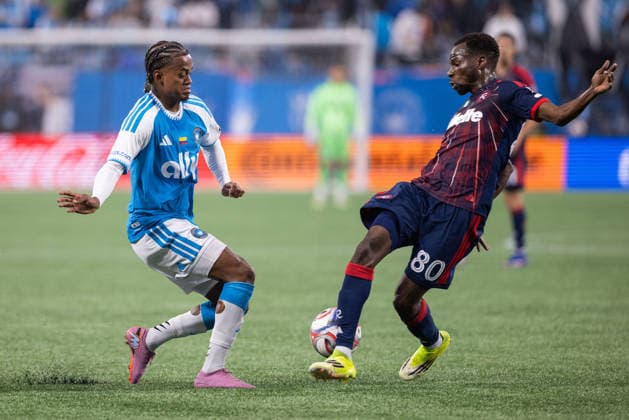 MLS, Fussball Herren, USA 2026: New England At Charlotte FC May 23 May 23, 2026: New England Revolution midfielder Alhassan Yusuf (80) blocks the shot from Charlotte FC forward Kerwin Vargas (18) during the first half of the Major League Soccer match up at Bank of America Stadium in Charlotte, NC. (Scott Kinser CSM) (Credit Image: Â Scott Kinser Cal Media) Charlotte Nc United States EDITORIAL USE ONLY Copyright: xx ZUMA-20260523_zma_c04_059.jpg ScottxKinserx csmphotothree491477