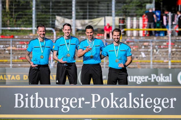 23.05.2026, xsefx, Fußball, Finale Bitburger Pokal, FC Viktoria Köln - S.C. Fortuna Koeln, Sportpark Höhenberg, Saison 2025 2026: Das Schiedsrichter - Quartett (v.l.) Patrick Dupont, Moritz Klein, Hauptschiedsrichter Tarik Damar und Luca Marx DFB regulations prohibit any use of photographs as image sequences and or quasi-video. Photo: xSabinexEffgenxPressefotoKochx Nordrhein-Westfalen Deutschland
