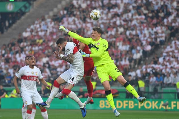 Strafraumszene.v.re.Torwart Alexander NUEBEL (VFB Stuttgart),Harry KANE (Bayern Muenchen), Jeff CHABOT (VFB Stuttgart), Aktion,Zweikampf Fussball 83. DFB Pokal Finale 2026 FC Bayern Muenchen - VfB Stuttgart 3-0 am 23.05.2026, Olympiastadion in Berlin. DFL DFB regulations prohibit any use of photographs as image sequences and or quasi-video