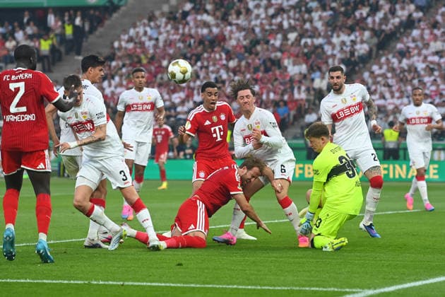 Strafraumszene.v.re.Torwart Alexander NUEBEL (VFB Stuttgart),Jeff CHABOT (VFB Stuttgart), Angelo STILLER (VFB Stuttgart), Harry KANE (Bayern Muenchen), Jamal MUSIALA (Bayern Muenchen), Ramon HENDRIKS (VFB Stuttgart),Chema ANDRES (VFB Stuttgart),Dayot UPAMECANO (Bayern Muenchen), Aktion,Zweikampf Fussball 83. DFB Pokal Finale 2026 FC Bayern Muenchen - VfB Stuttgart 3-0 am 23.05.2026, Olympiastadion in Berlin. DFL DFB regulations prohibit any use of photographs as image sequences and or quasi-video
