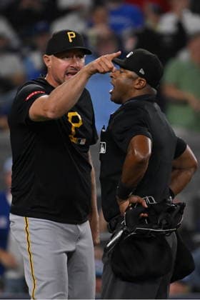 May 23, 2026, Toronto, On, Canada: Pittsburgh Pirates manager Don Kelly, left, argues with home plate umpire Alan Porter after being ejected from the game against the Toronto Blue Jays during sixth inning MLB, Baseball Herren, USA baseball action in Toronto on Saturday, May 23, 2026. Don Kelly, Alan Porter - ZUMAc35_ 20260523_zaf_c35_145 Copyright: xJonxBlackerx