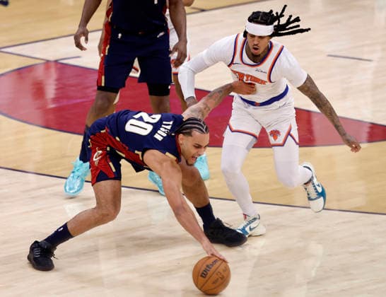 Cleveland Cavaliers Jaylon Tyson (20) regains control of the ball after having it knocked away by New York Knicks Jordan Clarkson (00) during the second quarter of their Eastern Conference Final game in Cleveland, Ohio Saturday May 23, 2026.  CLE20260523125 AARONxJOSEFCZYK