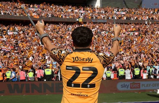 Hull City fans celebrate as Kyle Joseph of Hull City waves his crutches Hull City v Middlesbrough, EFL Sky Bet Championship, Play-Off Final, Football, Wembley Stadium, London, UK - 23 May 2026London Wembley Stadium United Kingdom EDITORIAL USE ONLY No use with unauthorised audio, video, data, fixture lists, club league logos or live services. Online in-match use limited to 120 images, no video emulation. No use in betting, games or single club league player publications. Copyright: xKieranxMcManus Shutterstockx 16887313jb
