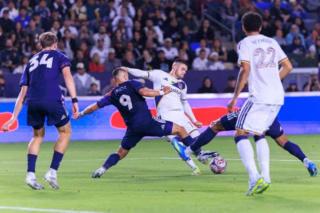 May 23, 2026, Carson, California, USA: Gabriel Pec 11 of the LA Galaxy makes a goal attempt as Ondrej Lingr 9 and Agustin Resch 34 of the Houston Dynamo FC defend during their regular season MLS, Fussball Herren, USA game on Saturday May 23, 2026 at the Dignity Health Sports Park Stadium in Carson, California. Galaxy tie with Dynamo, 1-1. ARIANA RUIZ PI Carson USA - ZUMAp124 20260523_zaa_p124_019 Copyright: xArianaxRuizx