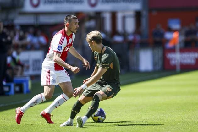 VOLENDAM - (lr) Steven Berghuis of AFC Ajax and Siebe Horemans of FC Utrecht during the Conference League play-off final match between AFC Ajax and FC Utrecht at the Kras Stadium on 24 May 2026 in Volendam, the Netherlands. SONNY LENSEN ANP Play-offs Conference League - FINAL 2025-2026 xVIxANPxSportx xxANPxIVx 559225690 originalFilename: 559225690.jpg