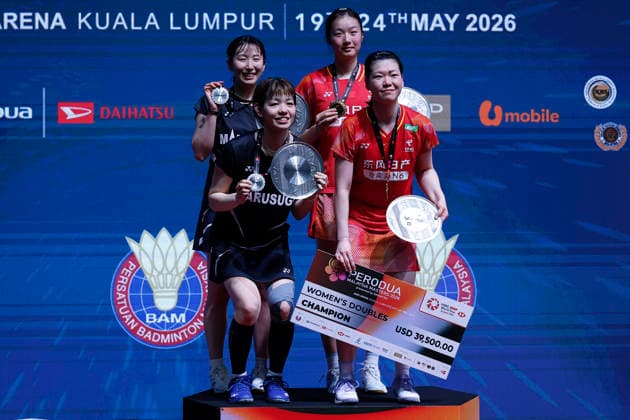 May 24, 2026, Kuala Lumpur, Malaysia: Luo Xu Min and Chen Fan Shu Tian of China (R) and Sayaka Hirota and Ayako Sakuramoto of Japan (L) pose with their medals on the podium at the medal ceremony after winning the Women s Doubles final during the Perodua Malaysia Masters 2026 at Unifi Arena. Luo Xu Min and Chen Fan Shu Tian won with scores; 21 25 : 16 23 Kuala Lumpur Malaysia - ZUMAs197 20260524_aaa_s197_008 Copyright: xWongxFokxLoyx