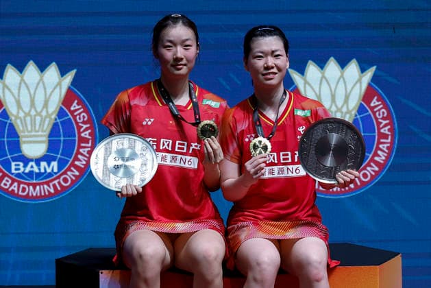 May 24, 2026, Kuala Lumpur, Malaysia: Luo Xu Min (R) and Chen Fan Shu Tian of China pose with their medals on the podium at the medal ceremony after winning the Women s Doubles final against Sayaka Hirota and Ayako Sakuramoto of Japan during the Perodua Malaysia Masters 2026 at Unifi Arena. Luo Xu Min and Chen Fan Shu Tian won with scores; 21 25 : 16 23 Kuala Lumpur Malaysia - ZUMAs197 20260524_aaa_s197_007 Copyright: xWongxFokxLoyx