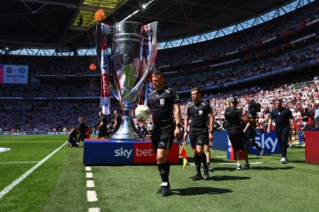 Match Officials walk out Bolton Wanderers v Stockport County, EFL Sky Bet League One, Play-Off Final, Football, Wembley Stadium, London, UK - 24 May 2026London Wembley Stadium United Kingdom EDITORIAL USE ONLY No use with unauthorised audio, video, data, fixture lists, club league logos or live services. Online in-match use limited to 120 images, no video emulation. No use in betting, games or single club league player publications.  Copyright: xJamesxMarsh Shutterstockx 16889809z