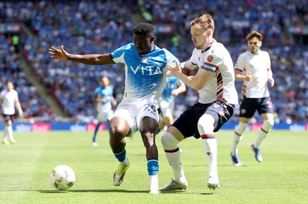 Max Metcalfe of Stockport County in action against George Johnston of Bolton Wanderers Bolton Wanderers v Stockport County, EFL Sky Bet League One, Play-Off Final, Football, Wembley Stadium, London, UK - 24 May 2026London Wembley Stadium United Kingdom EDITORIAL USE ONLY No use with unauthorised audio, video, data, fixture lists, club league logos or live services. Online in-match use limited to 120 images, no video emulation. No use in betting, games or single club league player publications.  Copyright: xKieranxMcManus Shutterstockx 16889802cc