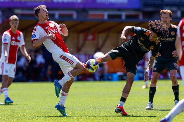 2026-05-24 AFC Ajax v FC Utrecht - Dutch Eredivisie Play-Offs VOLENDAM, NETHERLANDS - MAY 24: Youri Regeer of AFC Ajax battles for possession with Gjivai Zechiel of FC Utrecht during the Dutch Eredivisie Play-Offs match between AFC Ajax and FC Utrecht at Kras Stadion on May 24, 2026 in Volendam, Netherlands. Volendam Kras Stadion Netherlands Content not available for redistribution in The Netherlands directly or indirectly through any third parties. Copyright: xBenxGalx