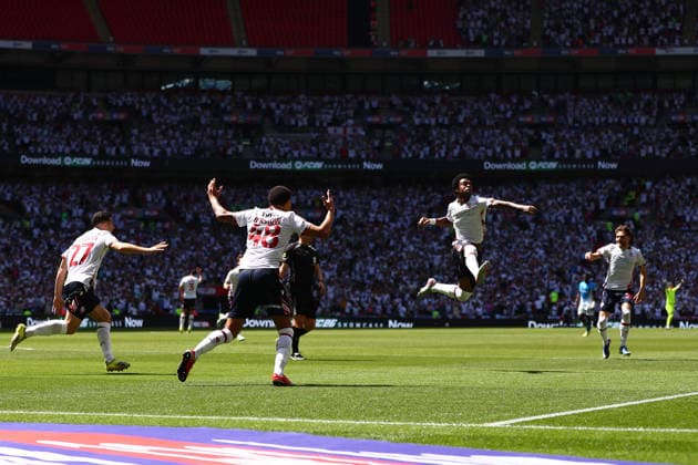 London, England, 24th May 2026. Bolton Wanderers players celebrate the first goal during the Bolton Wanderers vs Stockport County Sky Bet League 1 play off final match at Wembley Stadium, London. Picture credit should read: Jake Youle Sportimage EDITORIAL USE ONLY. No use with unauthorised audio, video, data, fixture lists, club league logos or live services. Online in-match use limited to 120 images, no video emulation. No use in betting, games or single club league player publications. SPI_011_JY_Stockport_County_Bolton_Wanderers SPI-4821-0011