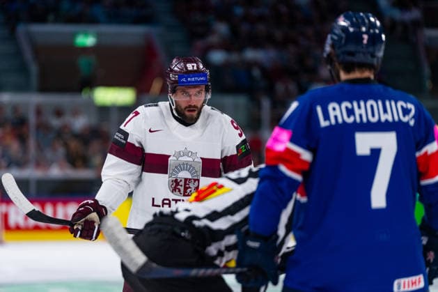 ZURICH, SWITZERLAND - MAY 24: Haralds Egle (Latvia, 97) before the duel against Robert Lachowitz (Great Britain, 7) during the Preliminary Round - Group A Match 43 between Great Britain and Latvia at the IIHF Ice hockey, Eishockey World Championship, WM, Weltmeisterschaft 2026, Swiss Life Arena on May 24, 2026 in Zurich, Switzerland. Zurich Switzerland Copyright: xTimoxSteinx