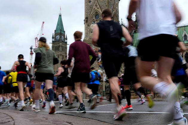 May 24, 2026, Ottawa, On, CAN: Runners pass the Peace Tower on Parliament Hill as they start the Ottawa Marathon in Ottawa, on Sunday, May 24, 2026. Canada News - May 24, 2026  - ZUMAc35_ 0857449628st Copyright: xJustinxTangx