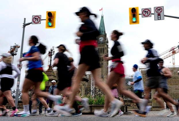 May 24, 2026, Ottawa, On, CAN: Runners pass the Peace Tower on Parliament Hill as they start the Ottawa Marathon in Ottawa, on Sunday, May 24, 2026. Canada News - May 24, 2026  - ZUMAc35_ 0857449630st Copyright: xJustinxTangx