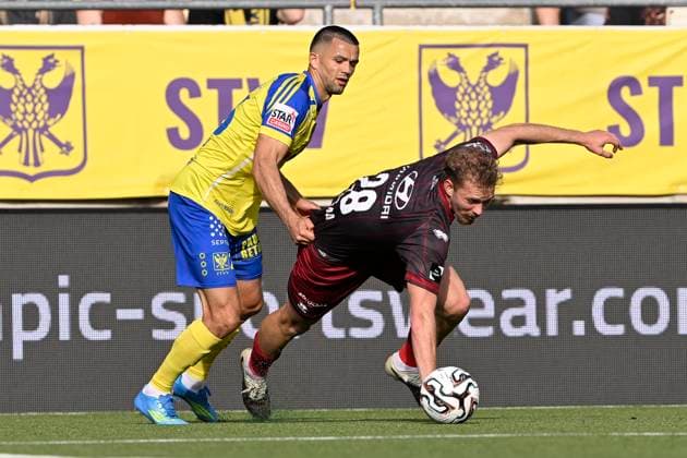 Sint-Truidense VV v KV Mechelen - Jupiler Pro League Champions Play-Off SINT-TRUIDEN, BELGIUM - MAY 24 : Musliu Visar defender of Sint-Truidense VV and Boersma Bouke forward of KV Mechelen during the Jupiler Pro League Champions Play-Off match between Sint-Truidense VV and KV Mechelen on May 24, 2026 in Sint-Truiden, Belgium, 24 05 2026 Sint-Truiden Belgium  Copyright: xDhax