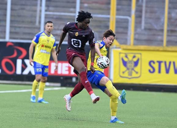 Mechelen s Dikeni Salifou and STVV s Rihito Yamamoto fight for the ball during a soccer match between Sint-Truiden VV and KV Mechelen, Sunday 24 May 2026 in Sint-Truiden, on the last day of the Champion s Play-offs of the 2025-2026 Jupiler Pro League first division of the Belgian championship. JOHNxTHYS  x174934794x