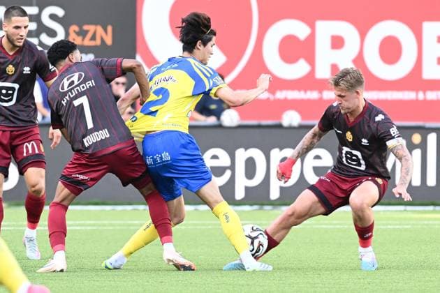 Mechelen s Therence Koudou, STVV s Keisuke Goto and Mechelen s Fredrik Hammar pictured in action during a soccer match between Sint-Truiden VV and KV Mechelen, Sunday 24 May 2026 in Sint-Truiden, on the last day of the Champion s Play-offs of the 2025-2026 Jupiler Pro League first division of the Belgian championship. JILLxDELSAUX  x174937440x