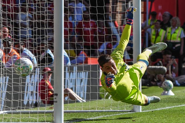 Nottingham Forest v Bournemouth, English Premier League, The City Ground, Nottingham, UK - 24 May 2026 Bournemouth s Djordje Petrovic dives but cant stop Nottingham Forest s Morgan Gibbs-White shot and goal , UK NEWSPAPERS OUT Copyright: xRichardxBowcottx