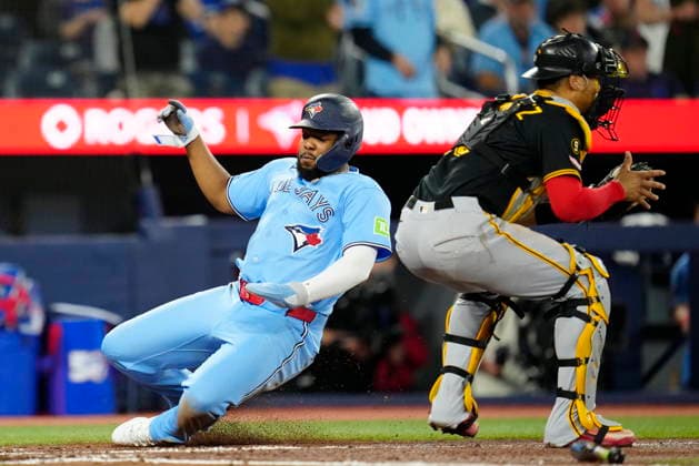 May 25, 2026, Toronto, On, Canada: Toronto Blue Jays first baseman Vladimir Guerrero Jr. (27) scores on a Ernie Clement single during fourth inning MLB, Baseball Herren, USA baseball action against the Pittsburgh Pirates in Toronto on Sunday, May 24, 2026. Canada News - May 25, 2026  - ZUMAc35_ 20260525_zaf_c35_011 Copyright: xFrankxGunnx