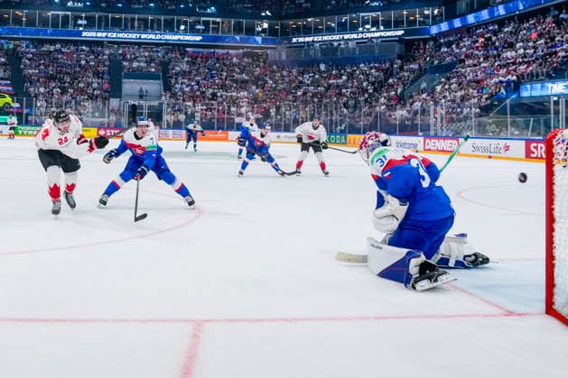 FRIBOURG, SWITZERLAND - MAY 24: Dylan Cozens of Canada L) against Maxim Strbak of Slovakia R) during the 2026 IIHF Ice hockey, Eishockey World Championship, WM, Weltmeisterschaft Switzerland game between Slovakia and Canada at BCF Arena on May 24, 2026 in Fribourg, Fribourg. Fribourg BCF Arena Fribourg Switzerland Copyright: xJustPictures.ch JarixPestelaccix jp-en-EuSpIm-JP6_JAR_Slovakia_Canada_24May2026_00061